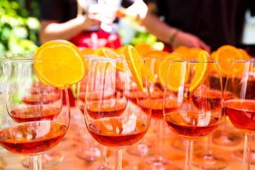 Close up of pouring in aperitif at an outdoor bar