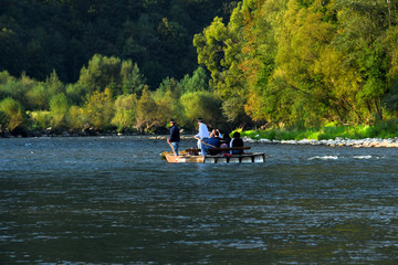 Classic raft during the Dunajec River Gorge rafting in the Pieniny National Park Park in Poland 