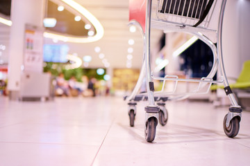 Close up of trolley in airport terminal or shopping mall.