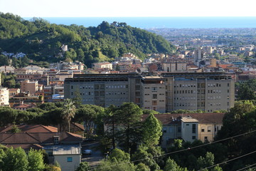 Fototapeta premium Panoramic view of the city of Carrara, at the foot of the Apuan
