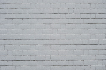 Abstract weathered textured white brick wall background