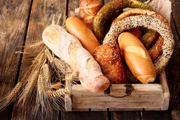 Fresh bread on the wooden table 
