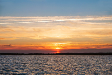 Grand sunset on the lake in the summer. Lake Svityaz in Ukraine. Ukrainian nature. Copy space.