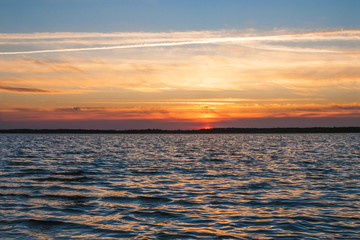 Obraz premium Grand sunset on the lake in the summer. Lake Svityaz in Ukraine. Ukrainian nature. Copy space.