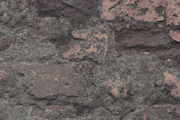 Fragment of an old brick wall close up. Industrial or loft style texture