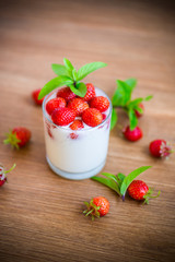 sweet homemade yogurt with fresh ripe strawberries
