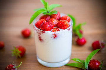 sweet homemade yogurt with fresh ripe strawberries