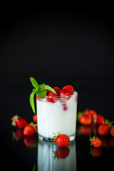 sweet homemade yogurt with fresh ripe strawberries