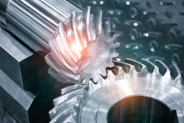 Gears, impaled on the shaft spline. Replacement spare part of the machine tool.