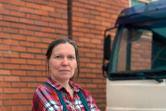 Female Farmer And Medium Duty Farm Truck