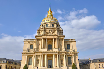 Fototapeta premium Scenic view of catholic cathedral (Les Invalides) in old touristic historic city Paris. Beautiful summer happy look of old christian temple in ancient capital of France