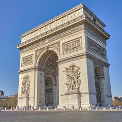 Fototapeta na wymiar Scenic view of Triumphal arch (Arc de Triomphe) in old touristic historic city Paris. Beautiful summer happy look of one of most popular tourist attractions in ancient capital of France
