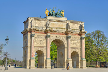 Fototapeta na wymiar Scenic view of Triumphal arch (Arc de Triomphe) in old touristic historic city Paris. Beautiful summer happy look of one of most popular tourist attractions in ancient capital of France