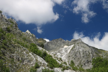 White Carrara marble quarry in the Apuan Alps. A mountain peak n