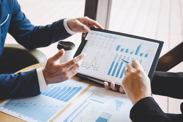 Professional Business partner team discussing on meeting to presentation planning investment project working analyzing and strategy of business making conversation with partner company