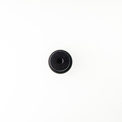 round black cap from the pencil case on white background - 271483915