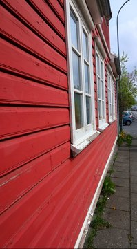 Close up of a red Scandinavian house.
