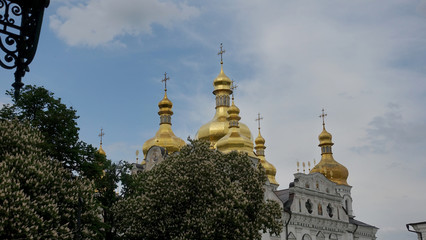 Fototapeta na wymiar Golden domes of the Assumption Cathedral in Kiev Pechersk Lavra