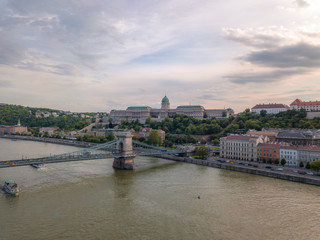 Fototapeta na wymiar Aerial of Danube river panorama with a view on Buda castle and Chain Bridge in central Budapest
