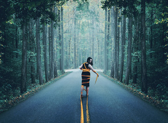 Woman wrapped up in road.