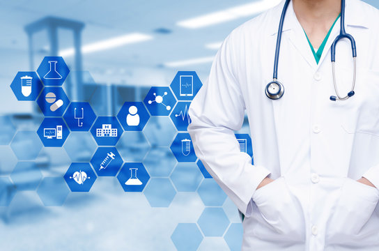 professional doctor with a stethoscope around his neck on blurred image of waiting room at hospital background with medical icon and hexagon shaped pattern, health care and medical technology concept
