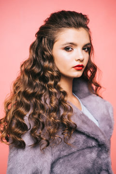 Healthy Curls That Look Bouncy. Hair Styling In Beauty Salon. Teenage Girl With Stylish Wavy Hairstyle. Pretty Girl With Curly Hairstyle. Young Woman With Long Locks Of Hair. Healthy Hair Care Habits