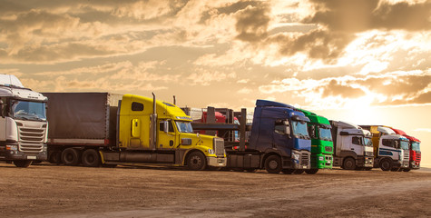 trucks in the Parking lot near the highway