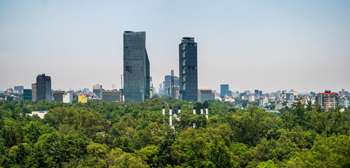 Obraz premium View across Mexico City Skyline from Castle Chapultepec with the daily smog air condition