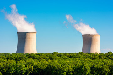 Steaming Cooling Towers at Nuclear Power Plant