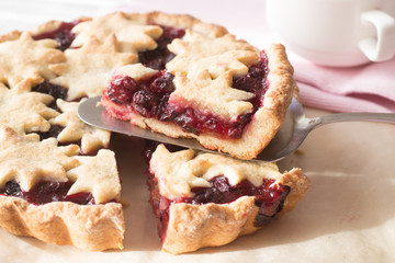 Cherry tart on wooden table