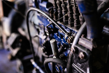 Mechanic opened the locking valve mechanism. Disassemble engine block vehicle. Old motor capital repair. Car service concept