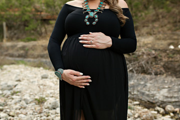 Pregnant Woman Maternity Belly in Black Dress