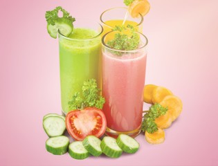 Healthy  vegetable juices on background