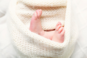 Newborn Baby Feet in Wrap