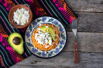 Mexican fideos dry soup with avocado and cheese