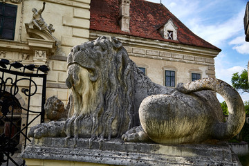 antique old stone lion statue