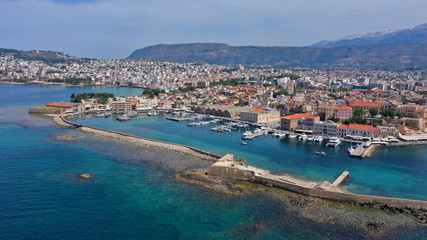 Fototapeta na wymiar Aerial drone panoramic view of iconic and picturesque Venetian old port of Chania with famous landmark lighthouse and traditional character, Crete island, Greece