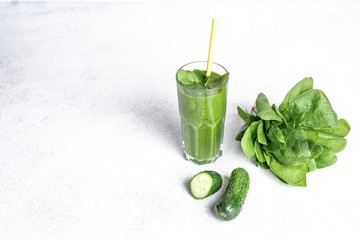 Organic berry and vegetable smoothie with oatmeal on a light background copy space. Healthy food. Lactose free diet.