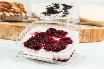 panna cotta - tasty dessert with blackberry sauce