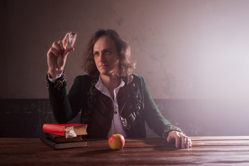 Physics the science of nature, the concept of studying the laws of nature. A young man in the image...