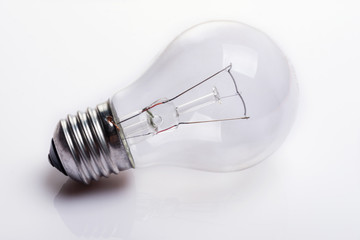 Light bulb on white background.  Close up. Selective focus.