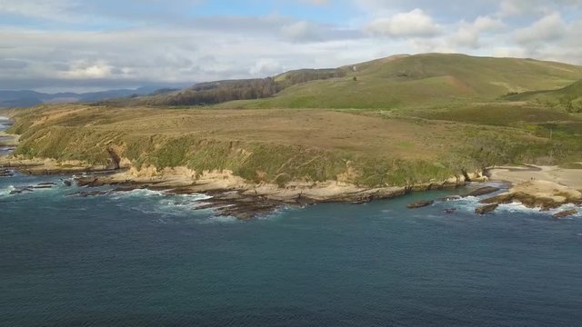 304 Big Sur aerial the ocean rocks mountain and clouds