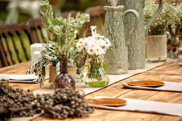 Details of the marriage ceremony held in the garden in the summer.