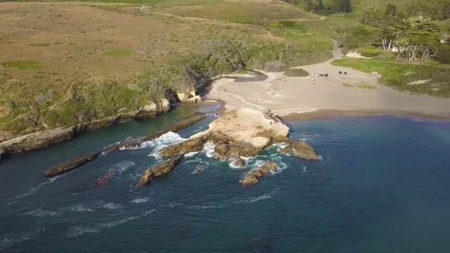 302 Big Sur aerial beach rocks a house and the ocean