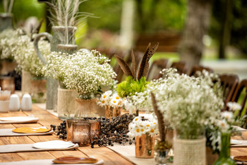 Details of the marriage ceremony held in the garden in the summer.