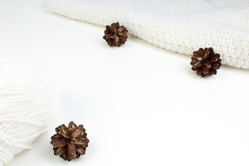 Sweater or scarf fabric texture large knitting. Knitted jersey background with a relief pattern. Wool hand- machine, handmade.