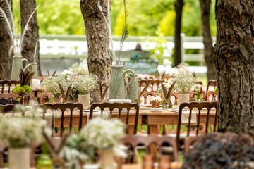Details of the marriage ceremony held in the garden in the summer.