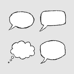 Set of hand-drawn speech bubbles on the green background