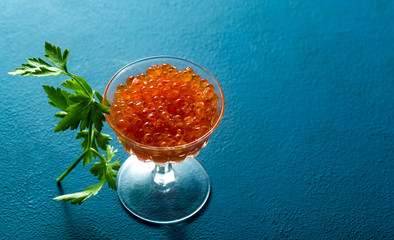 portion of red caviar on the table