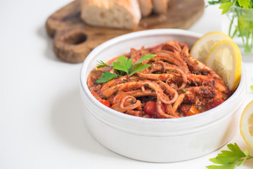 Italian musky octopus stew - Moscardini in umido, in wine and tomatoes.